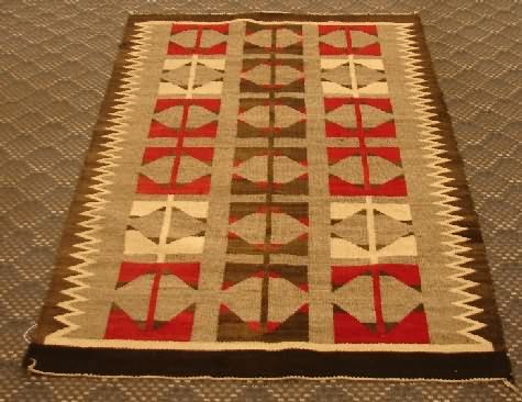 Appraisal: Navajo circa with red brown and tan design Call for