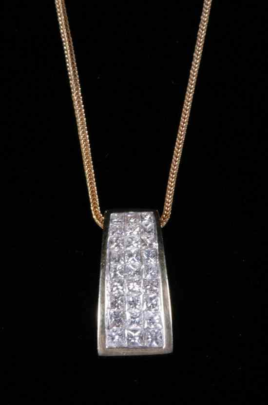 Appraisal: K YELLOW GOLD AND DIAMOND CONTEMPORARY DESIGN PENDANT ON CHAIN