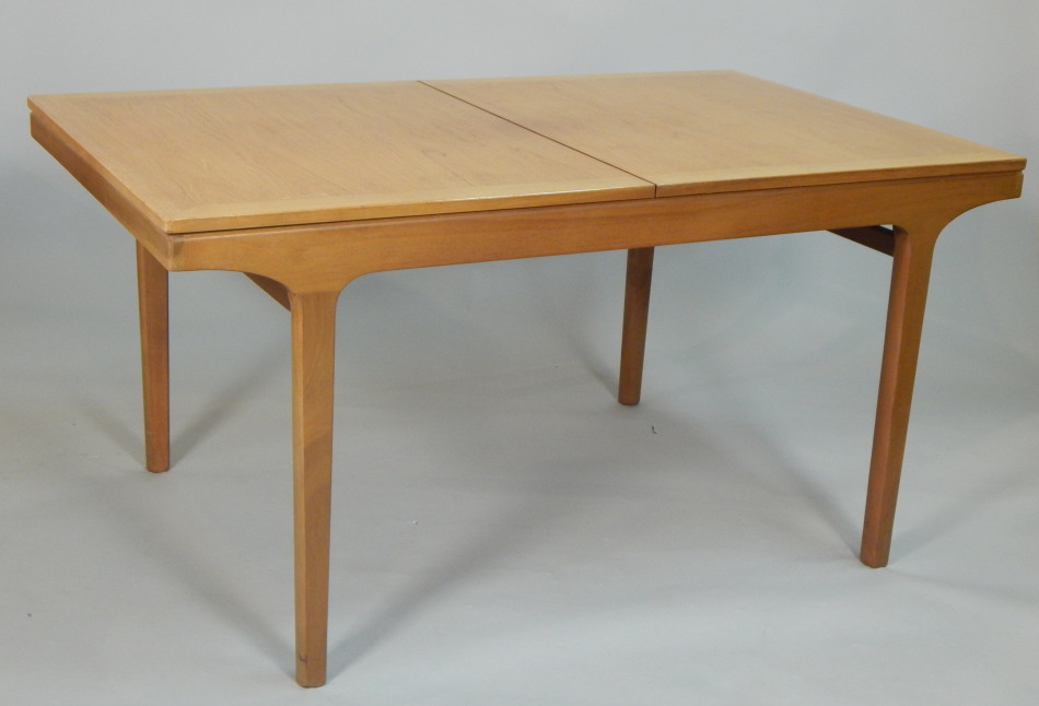 Appraisal: A 's retro style teak extending dining table the rectangular