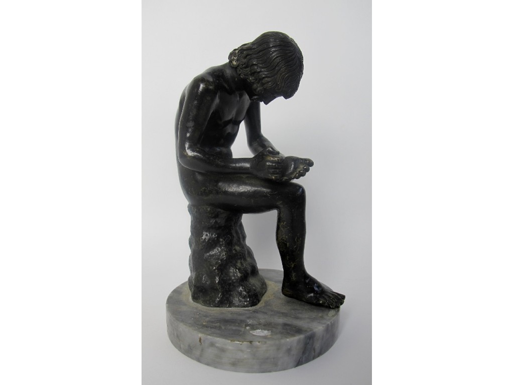 Appraisal: A bronze model of Spinario after the antique mounted on