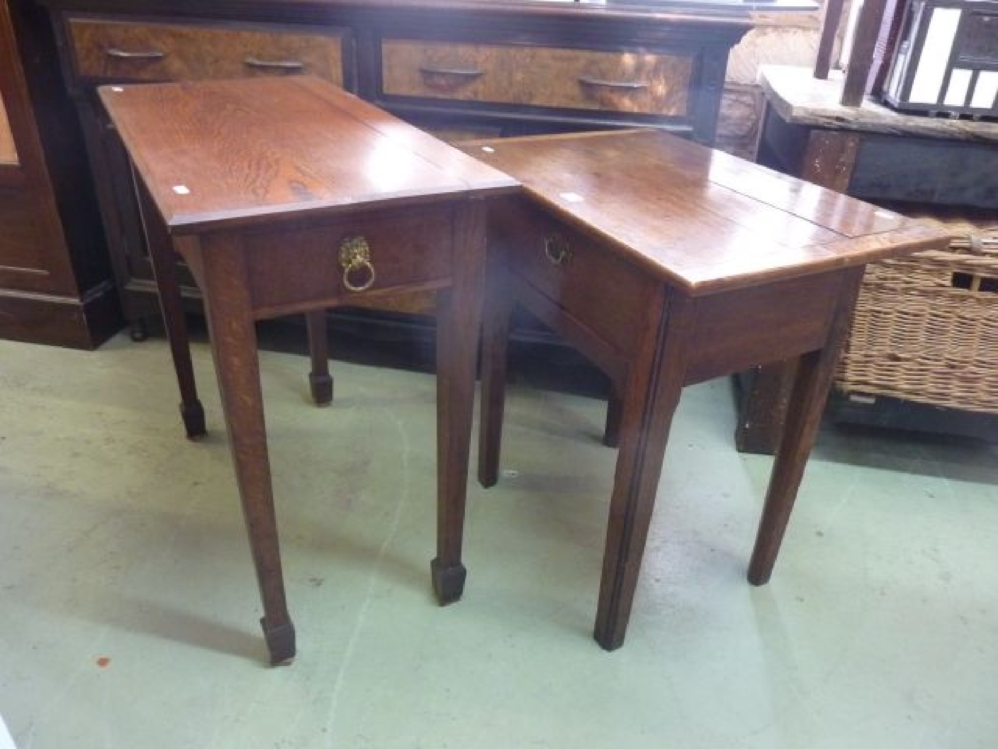 Appraisal: A small oak side table with cleated top over a