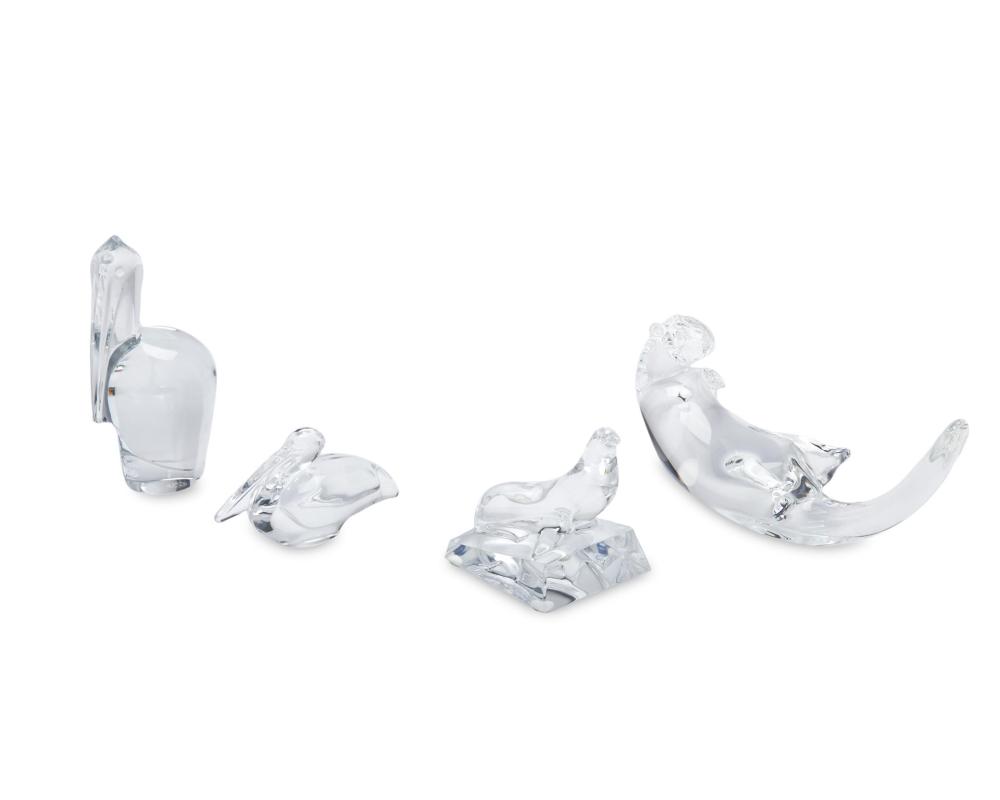 Appraisal: Four Baccarat and Steuben crystal coastal animal figures Second-half th