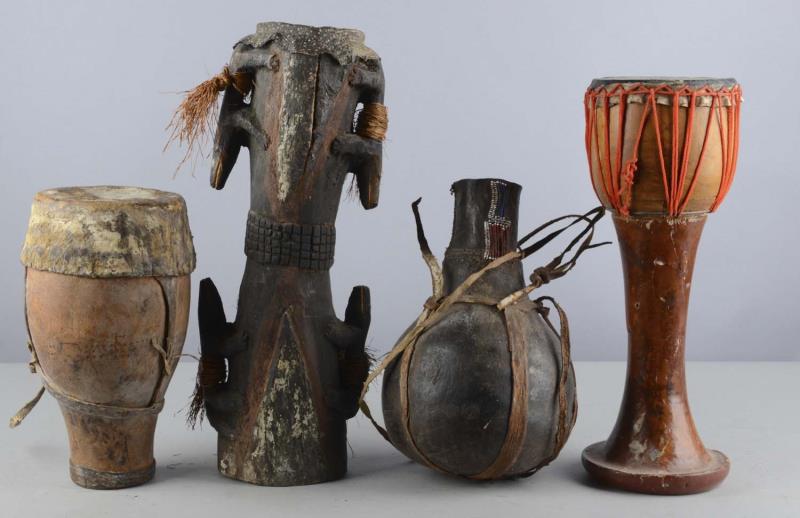 Appraisal: A Lot of Antique African Percussion Instruments Included are drums