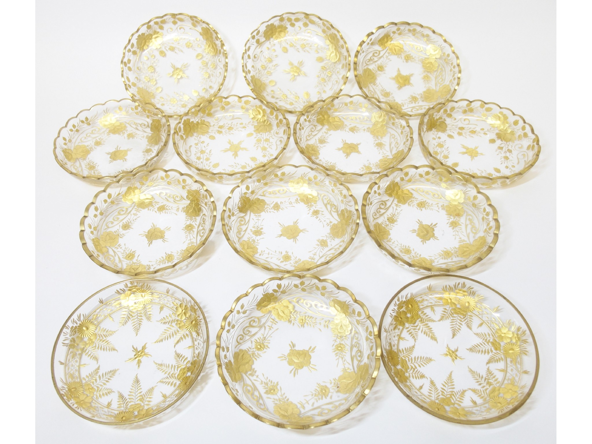 Appraisal: Eleven Continental cut-glass and parcel gilt dessert bowlscut-glass flowering vines