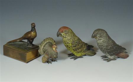 Appraisal: Two th century cold painted bronze parrots each cm high