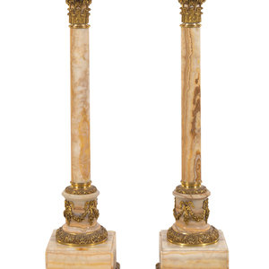 Appraisal: A Pair of French Gilt Bronze Mounted Onyx Pedestals Paris