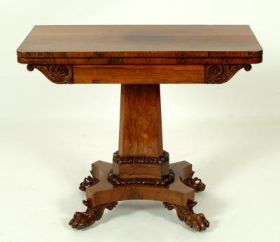 Appraisal: A WILLIAM IV ROSEWOOD FOLDING CARD TABLE of rounded oblong