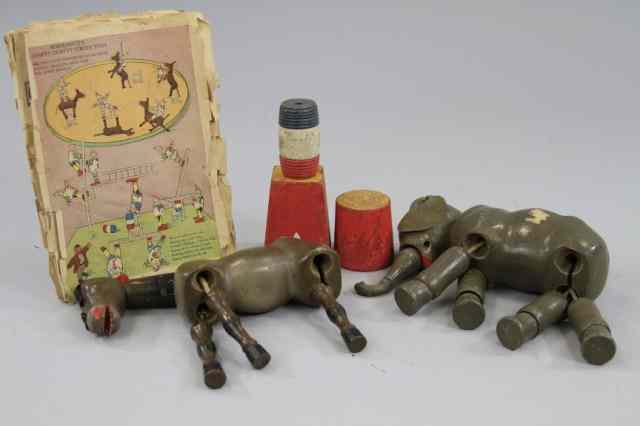 Appraisal: SCHOENHUT ANIMALS AND CATALOG Lot includes elephant and donkey both