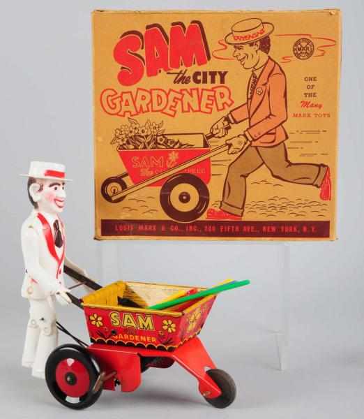 Appraisal: Tin Plastic Marx Sam the Gardener Wind-Up Toy American Working