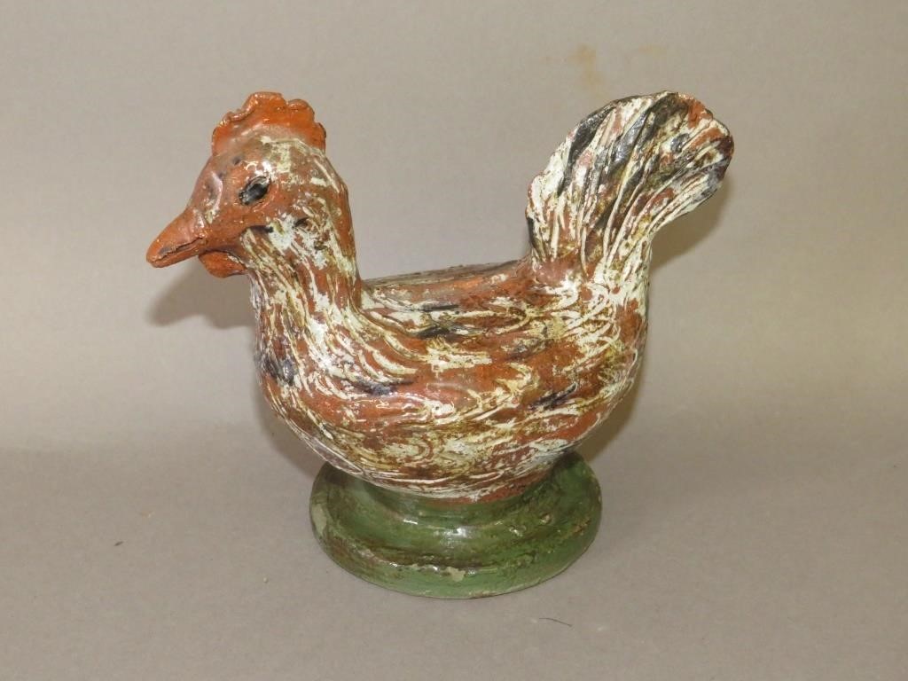 Appraisal: REDWARE FIGURAL SITTING CHICKEN BANKca late th century redware figural