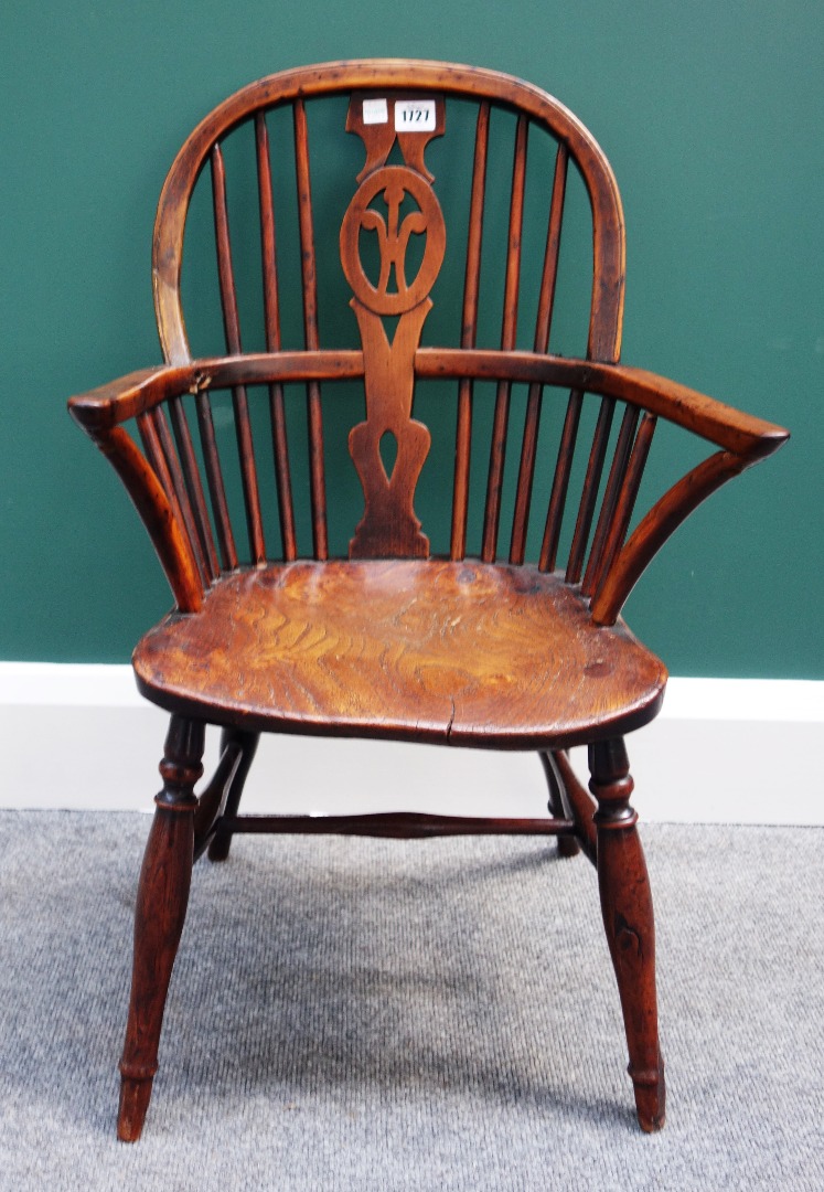 Appraisal: A George III yew and elm child's Windsor chair with