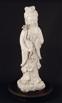 Appraisal: A Chinese Blanc de Chine type figure of Guanyin in