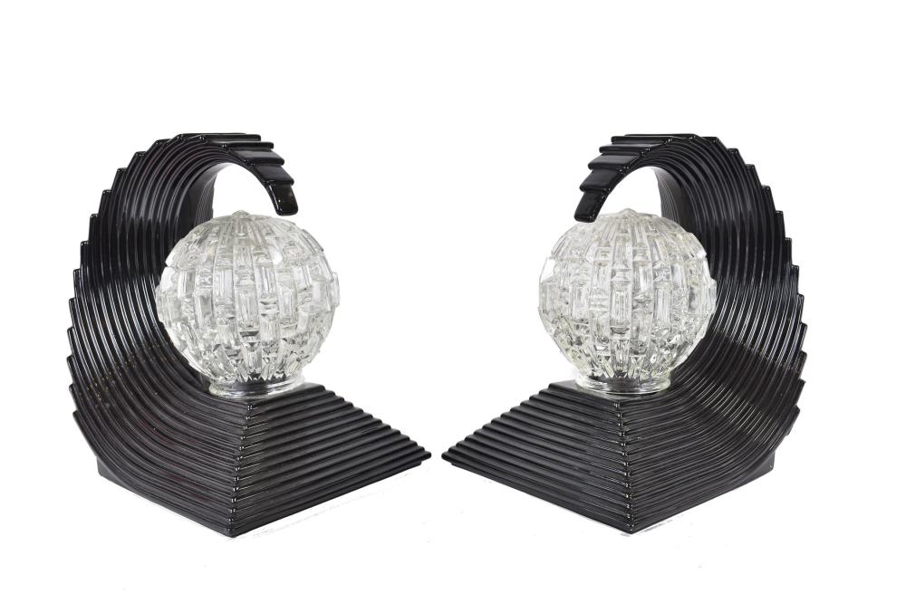 Appraisal: PAIR OF ART DECO STYLE BLACK AND COLORLESS LAMPSHeights in