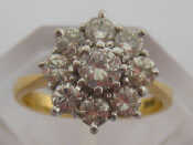 Appraisal: A diamond cluster ring the brilliants totalling approx carats the