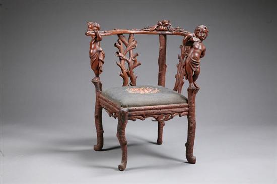 Appraisal: RUSTICATED CORNER CHAIR Probably France late th century hardwood Carved