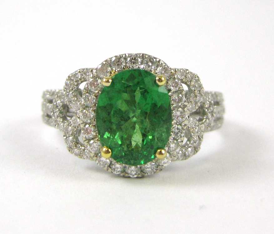 Appraisal: COLUMBIAN EMERALD AND DIAMOND RING k white and yellow gold