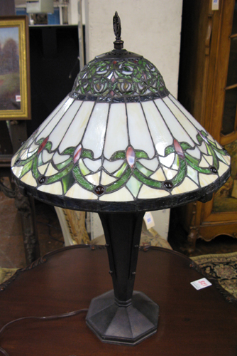 Appraisal: A STAINED AND LEAD GLASS TABLE LAMP two-light in the