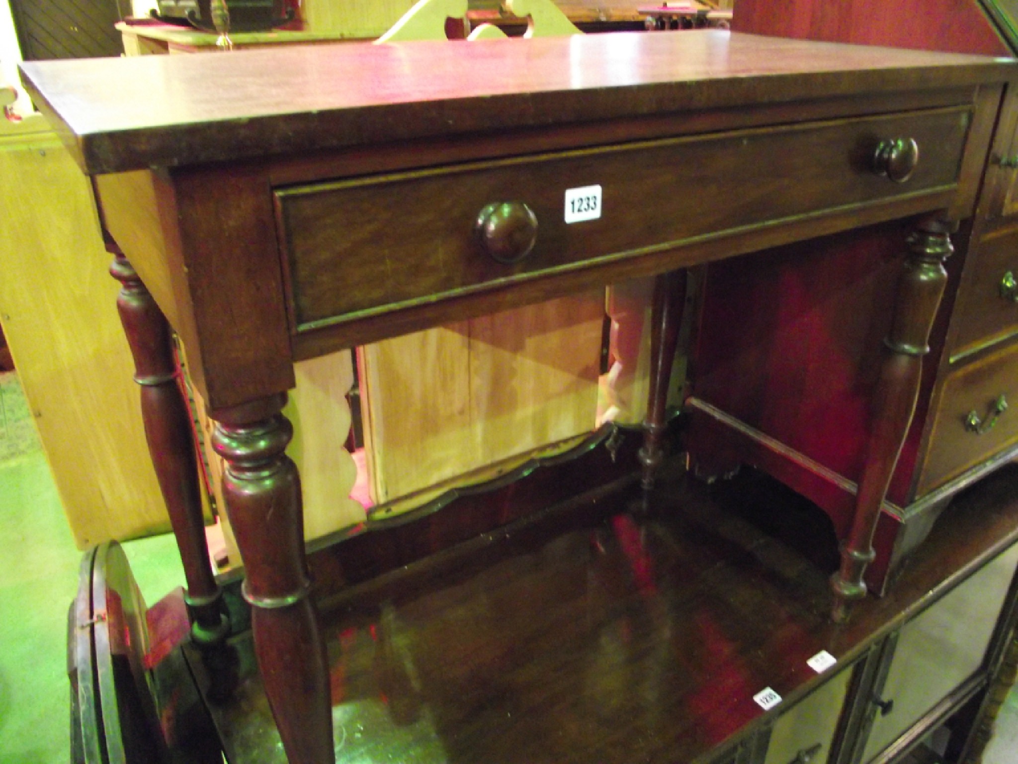 Appraisal: A th century mahogany side table with rectangular top over