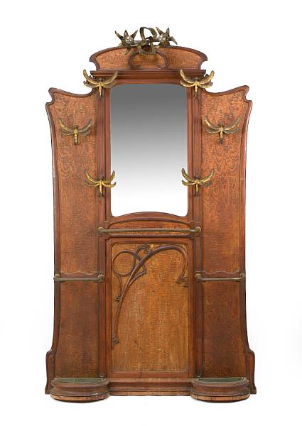 Appraisal: An Art Nouveau walnut and patinated metal hall stand circa