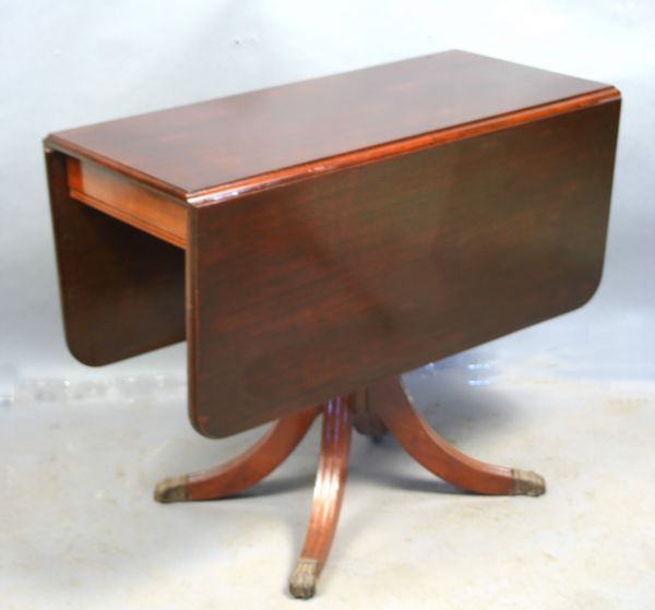 Appraisal: s s Duncan Phyfe mahogany drop-leaf table x w x