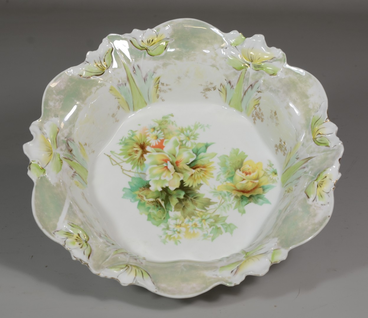 Appraisal: RS Prussia style porcelain bowl with green and yellow flowers