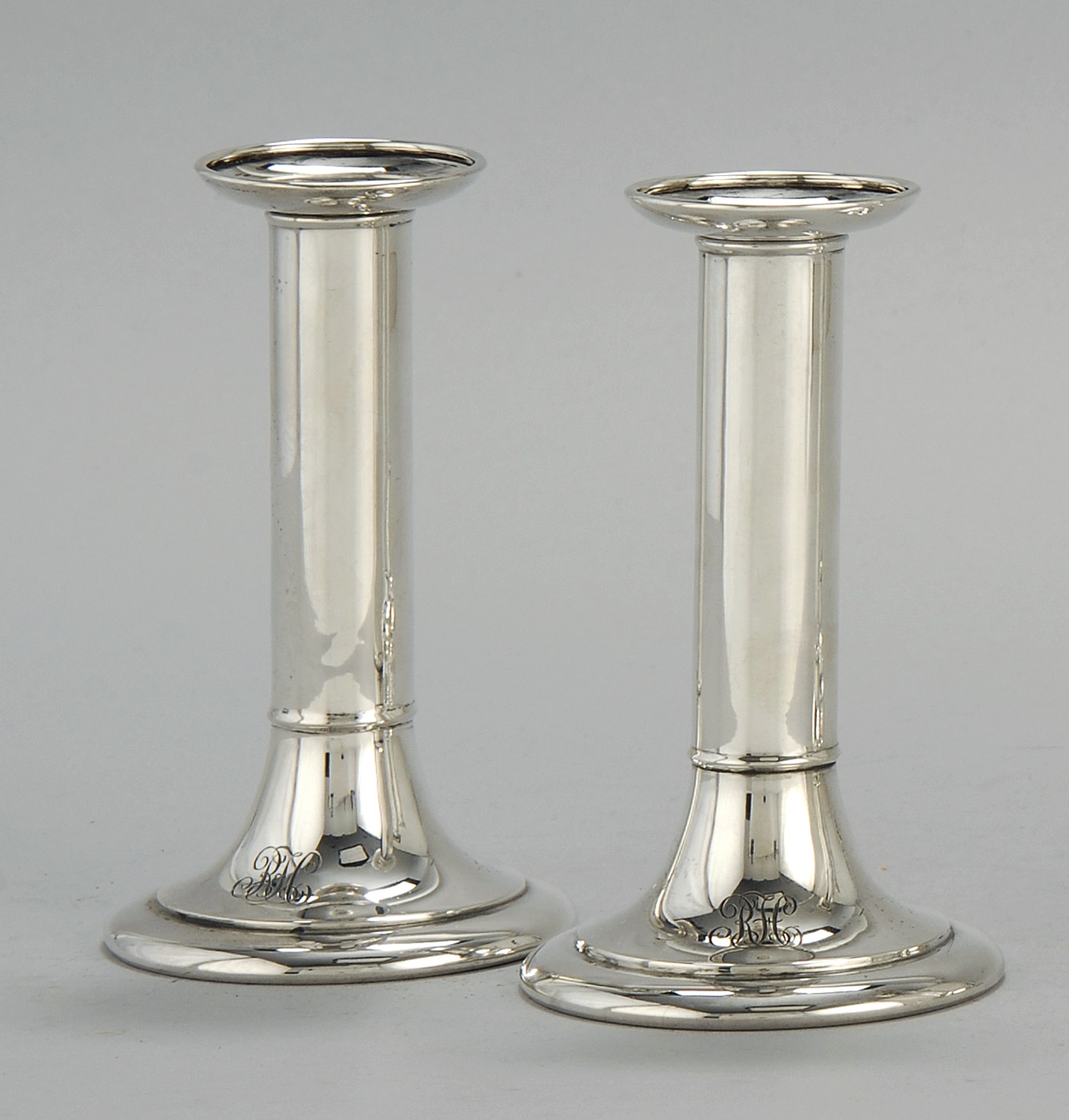 Appraisal: PAIR OF TIFFANY MOORE STERLING SILVER CANDLESTICKS In columnar form