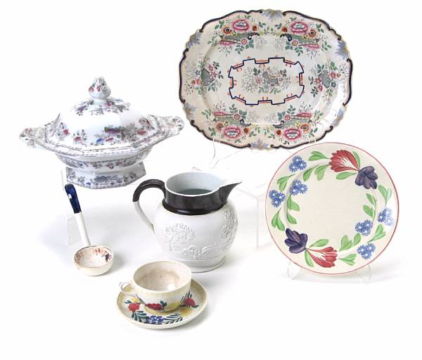 Appraisal: A group of English floral transfer decorated earthenware tableware comprising