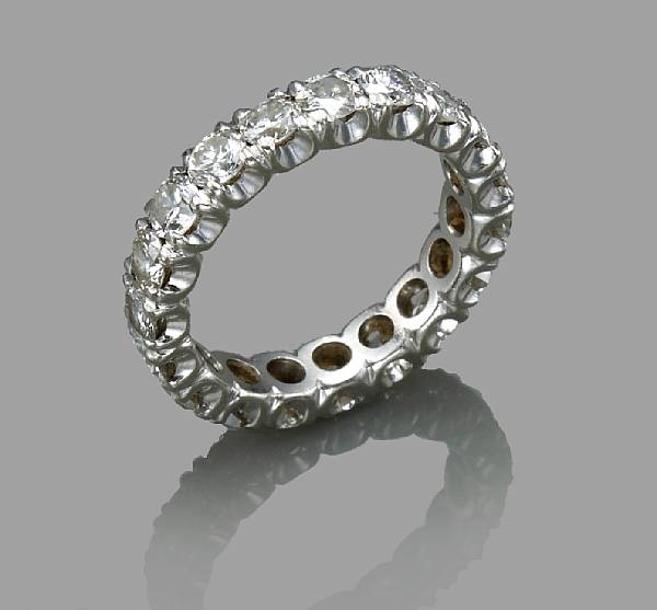 Appraisal: A diamond eternity band estimated total diamond weight carats mounted