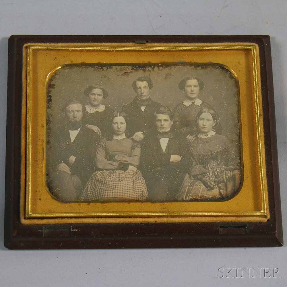 Appraisal: Quarter-plate Daguerreotype Family Portrait depicting a middle-aged couple with their