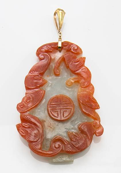 Appraisal: A carved jadeite jade and k gold pendant jade measuring