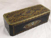 Appraisal: A rectangular ebony veneered rosewood box with cut corners and