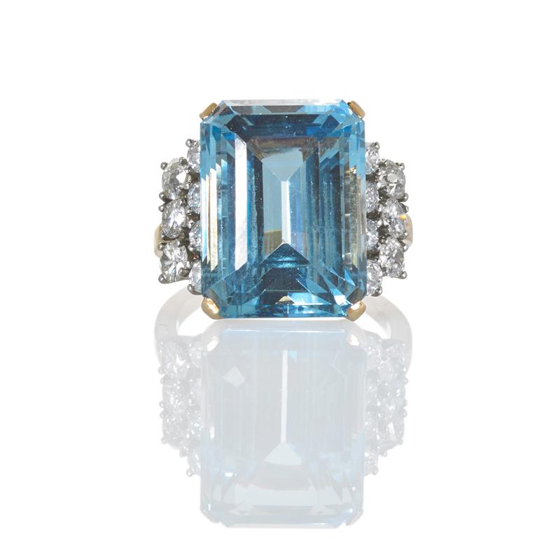 Appraisal: AQUAMARINE AND DIAMOND K GOLD RING CA Rectangular step cut