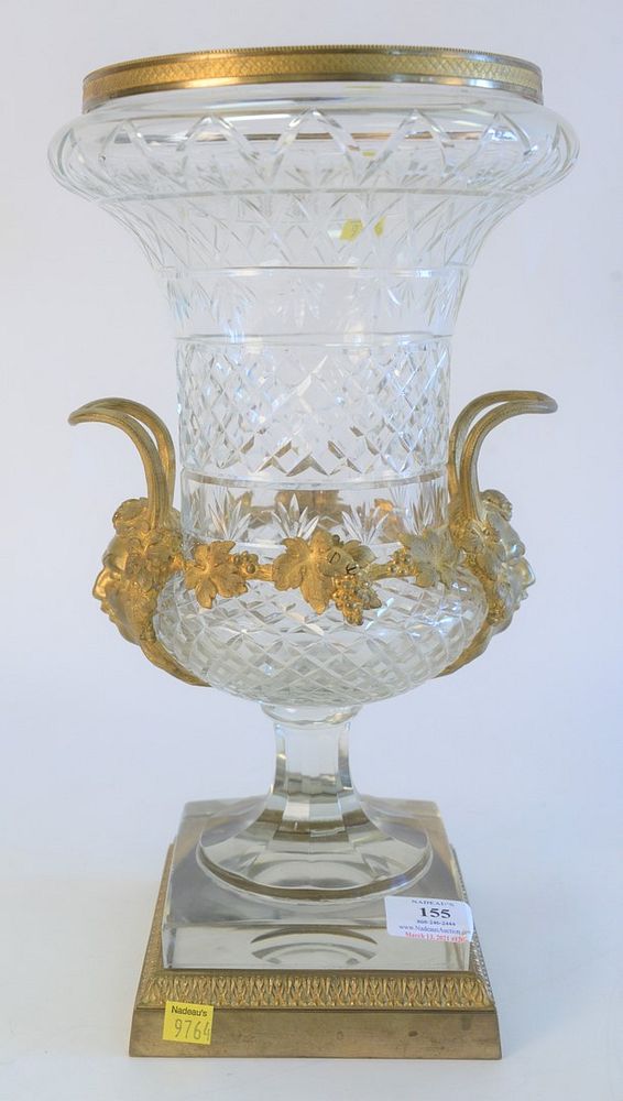 Appraisal: French Crystal and Gilt Bronze Urn having handles with face