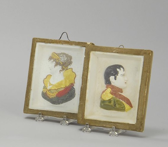 Appraisal: PAIR OF POLYCHROME BAS RELIEF CHALK PORTRAITS Circa Napoleon and