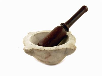 Appraisal: A white marble mortar in cm h and a turned