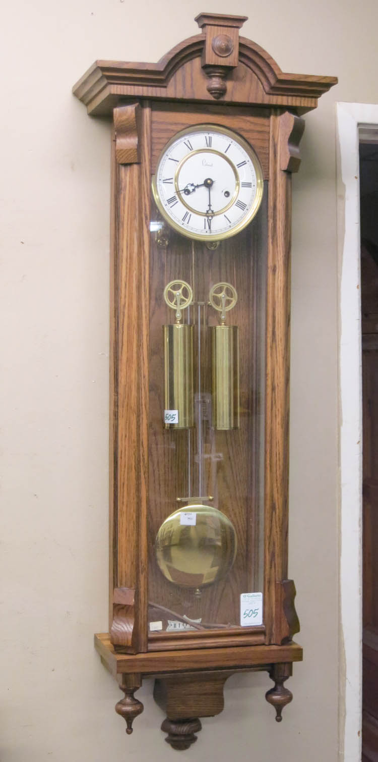 Appraisal: TWO-WEIGHT OAK LONGCASE WALL CLOCK Colonial Mfg Co Zeeland Michigan