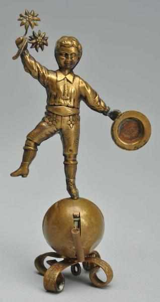 Appraisal: Dancing Boy Figural Tape Measure Description German Brass Rotating the