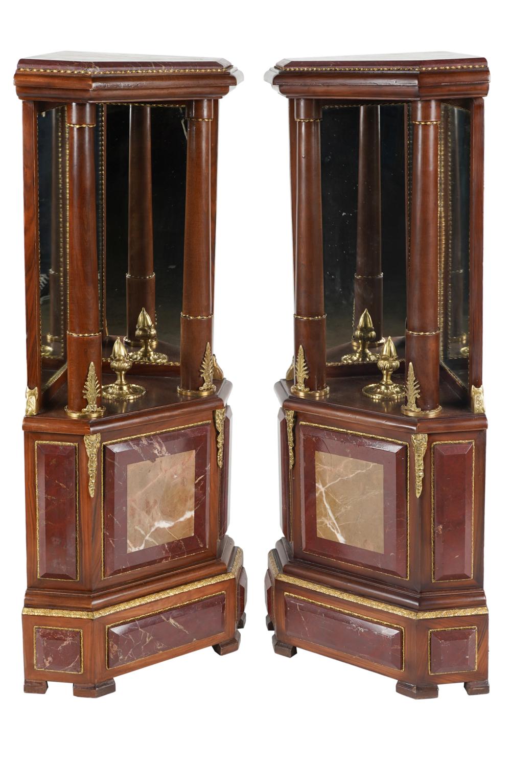 Appraisal: PAIR OF MAHOGANY MARBLE-INSET CORNER PEDESTALSlate th early st century