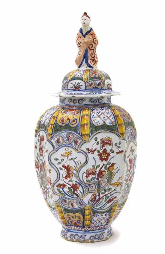 Appraisal: A Continental Faience Covered Vase having a Japanesque maiden finial