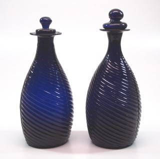 Appraisal: Blown Two early th century blown-molded glass cruet toilet bottles