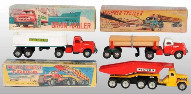 Appraisal: Lot of Tin Truck Friction Toys Description Japanese Working Includes