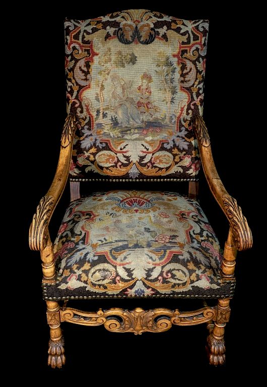 Appraisal: Carved Needlepoint Armchair Elaborately Carved Chair With Lion Paw Feet