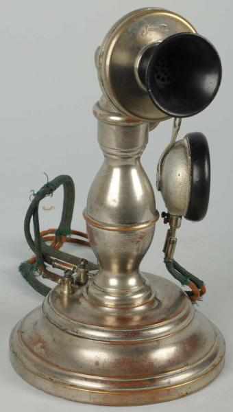 Appraisal: Pot Belly Stick Telephone Circa nickeled brass cast iron base