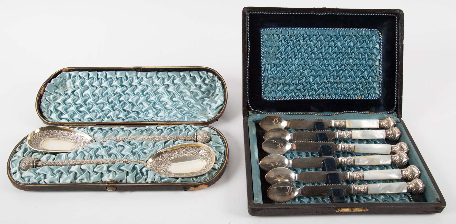 Appraisal: Two cased flatware sets including mother-of-pearl handled spoons and two