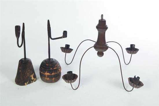 Appraisal: THREE LIGHTING DEVICES American st half- th century Two wrought