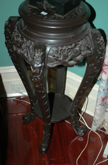 Appraisal: A CHINESE ROSEWOOD CARVED AND PIERCED PEDESTAL