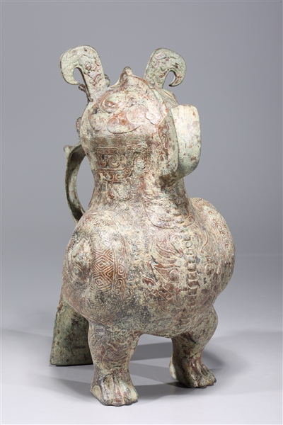 Appraisal: Chinese archaistic bronze metal animal form vessel with allover incised