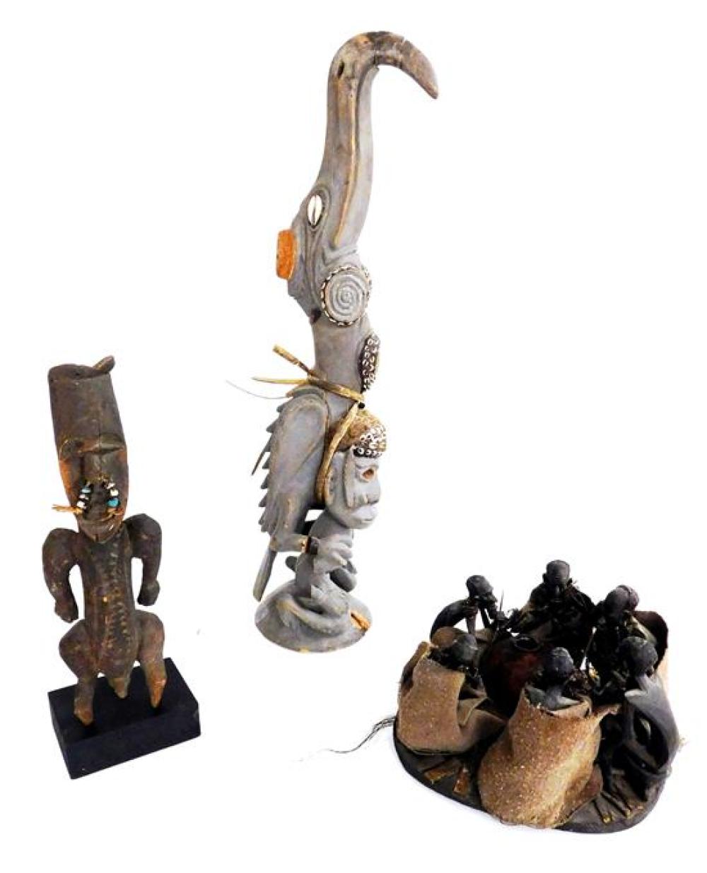 Appraisal: TRIBAL Two Papua New Guinea Figures and a possible Maasai