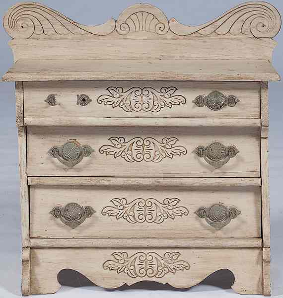 Appraisal: Child's Chest of Drawers American a carved and painted child's