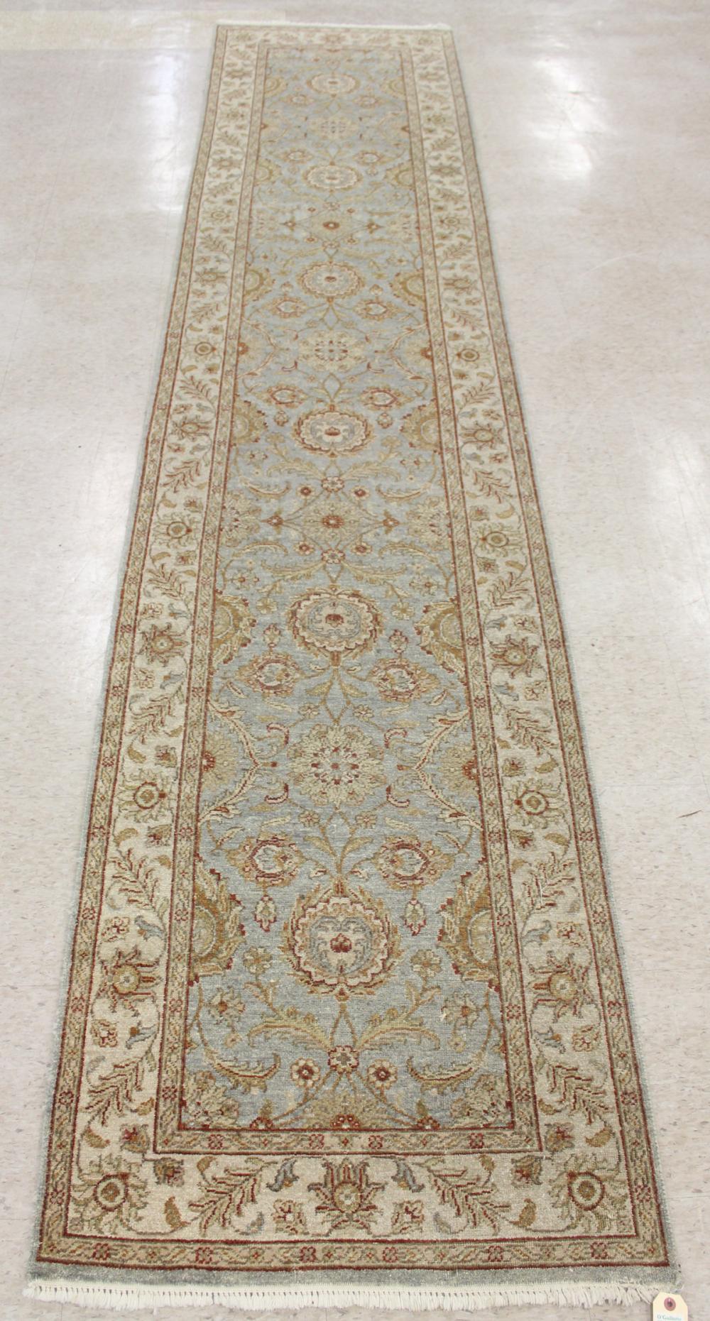 Appraisal: HAND KNOTTED ORIENTAL RUNNER Indo-Persian overall floral design ' x